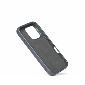 Coque Mujjo Shield Case pour iPhone 16 Pro en bleu acier, présentée avec l’intérieur, la découpe pour l’appareil photo et les protège-boutons.