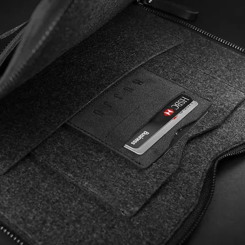 Mujjo Carry-On Folio Sleeve open shows dark felt side with leather card pocket, two visible cards and zipper along the edge.