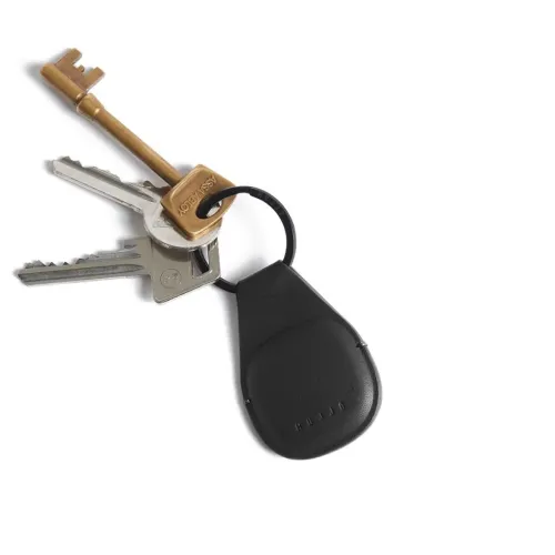 Mujjo Canopy Keychain black leather AirTag holder with magnetic closure, attached to a keyring with three keys