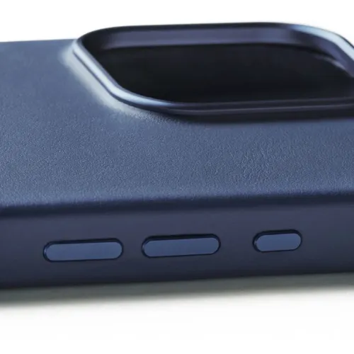 Mujjo läderfodral för iPhone 16 Pro Max i blått, med texturerad yta, kamerautskärning och sidoknappsskydd.