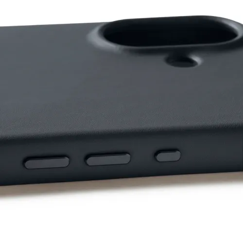 Mujjo nahast ümbris iPhone 17-le basaldist, lähivaates on kaamera väljavõte, väike ümmargune auk ja kolm varjatud külgmist nuppu.