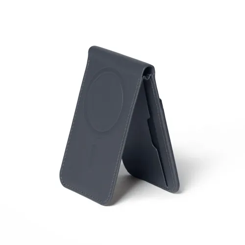 Magsafe wallet stand in basalt gray leather, arranged as a triangle with visible circular MagSafe embossing and side pocket.